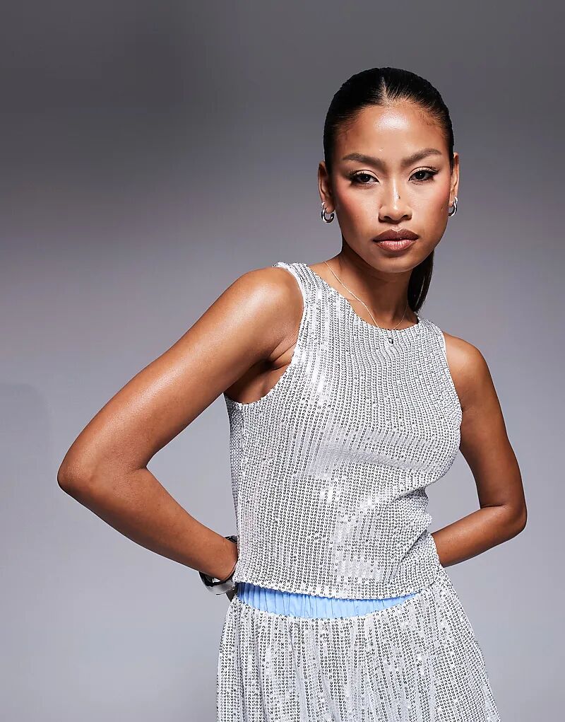 Топ-борцовка из сетки ASOS DESIGN с пайетками, серебристого цвета
Топ-борцовка из сетки ASOS DESIGN с пайетками, серебристого цвета