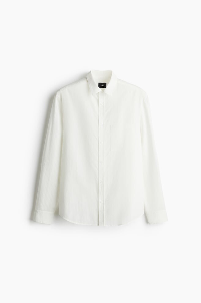 Рубашка из смеси лиоцелла, прямого кроя. H&M, белый
Рубашка из смеси лиоцелла, прямого кроя. H&M, белый