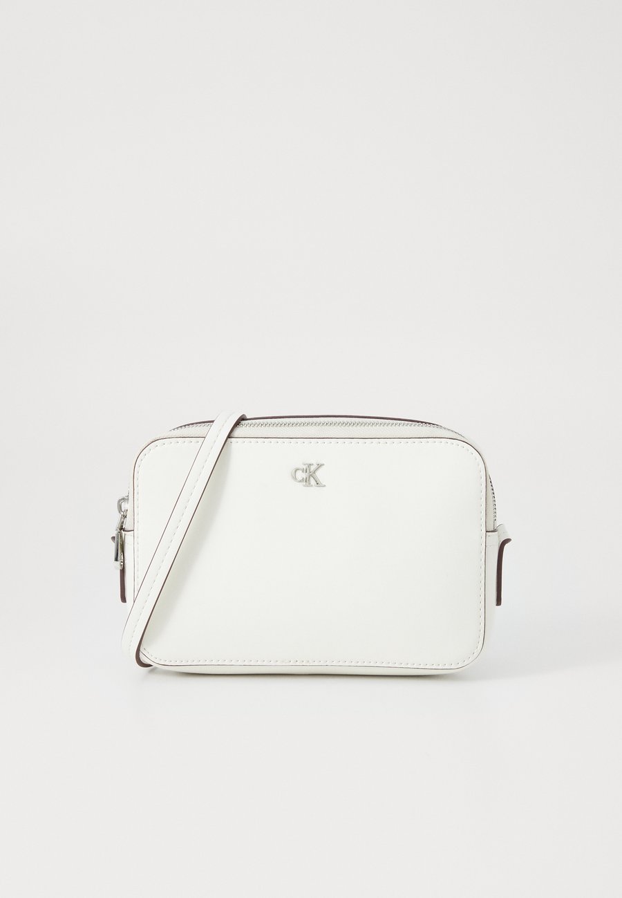 Сумка кросс-боди Calvin Klein HARDWARE MONOGRAM, White/Lilac
Сумка кросс-боди Calvin Klein HARDWARE MONOGRAM, White/Lilac