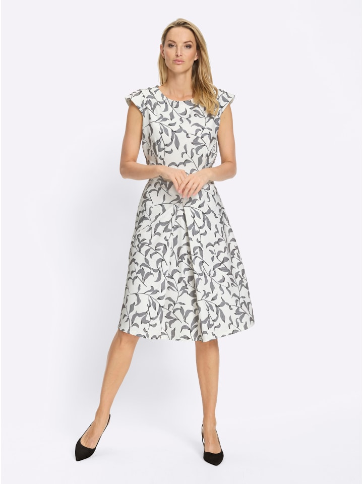 Heine Платье-футляр цвета экрю с черным принтом
Heine Платье-футляр цвета экрю с черным принтом