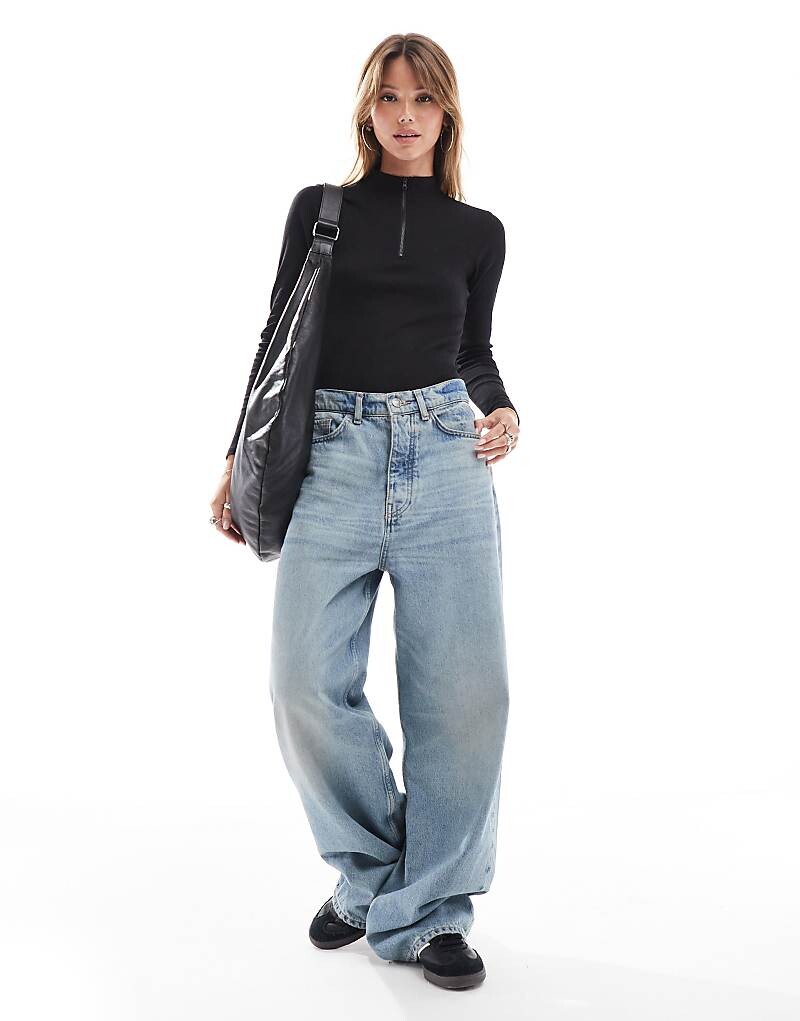 Threadbare – Черное боди с длинными рукавами и высоким воротником, застежкой на половину молнии и ребристой структурой
Threadbare – Черное боди с длинными рукавами и высоким воротником, застежкой на половину молнии и ребристой структурой