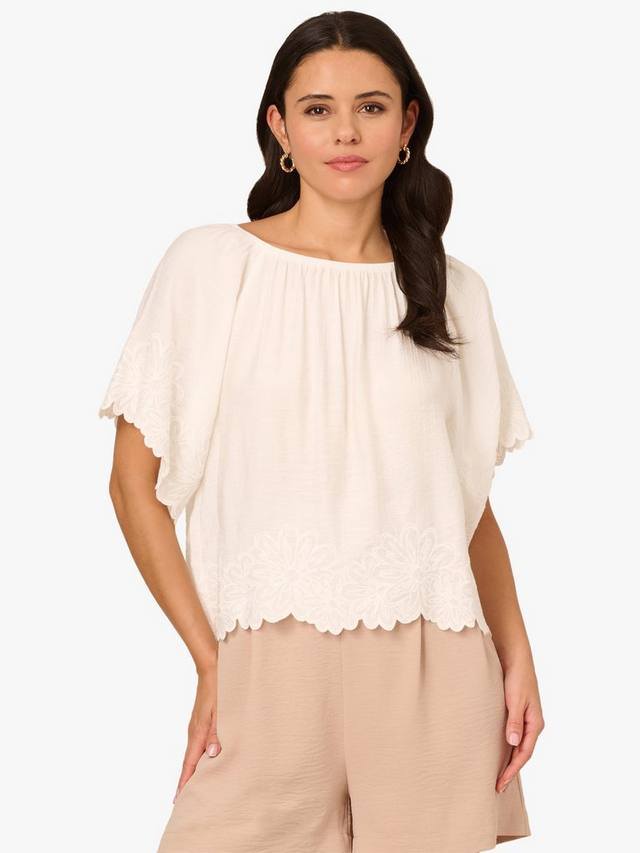 Блузка с цветочной вышивкой по подолу из жатой ткани Adrianna Papell
Блузка с цветочной вышивкой по подолу из жатой ткани Adrianna Papell