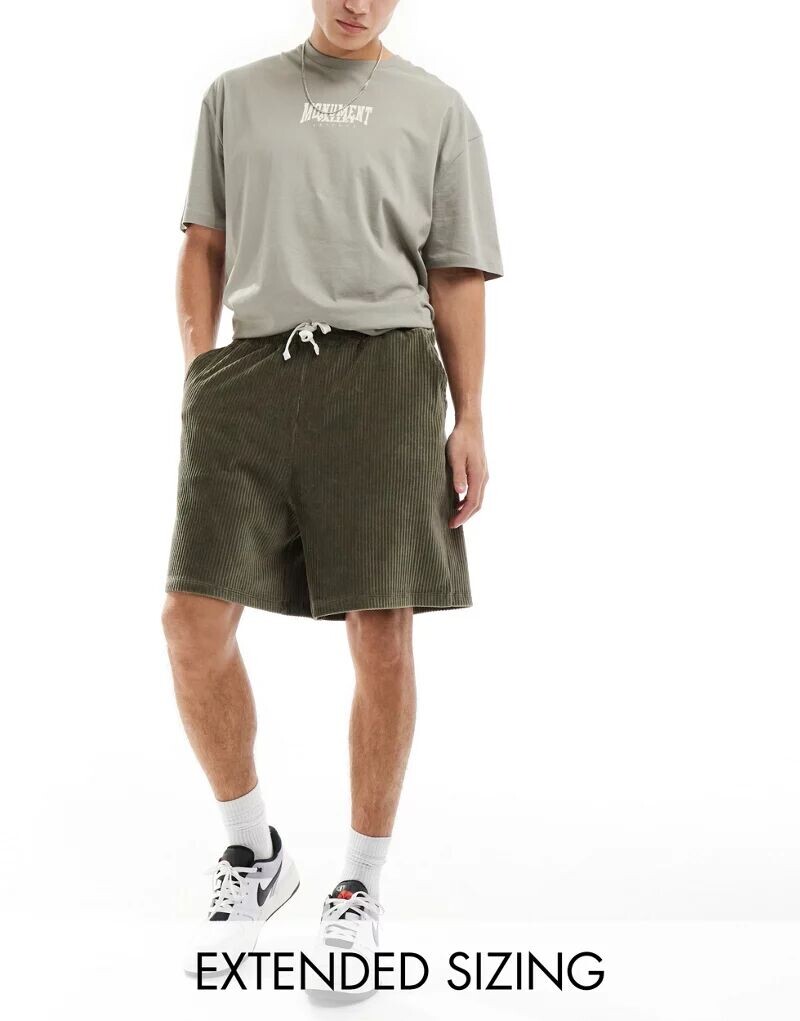 Темно-зеленые велюровые шорты в рубчик оверсайз ASOS
Темно-зеленые велюровые шорты в рубчик оверсайз ASOS