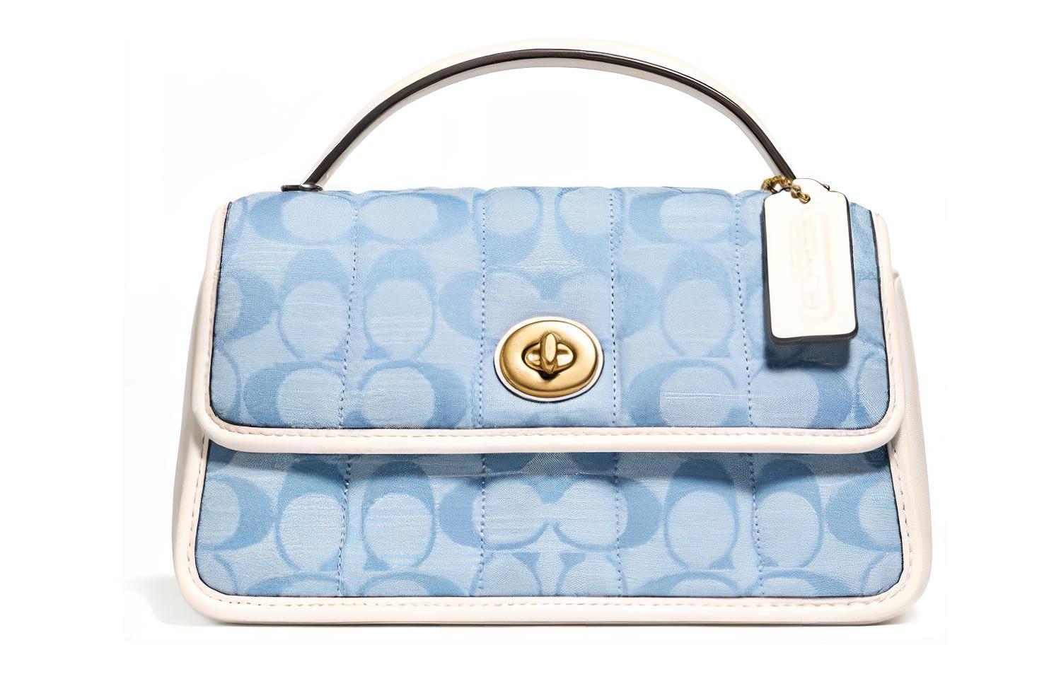 Сумка через плечо с поворотной застежкой и кожаным клапаном Trumpets женская синяя с монограммой COACH
Сумка через плечо с поворотной застежкой и кожаным клапаном Trumpets женская синяя с монограммой COACH