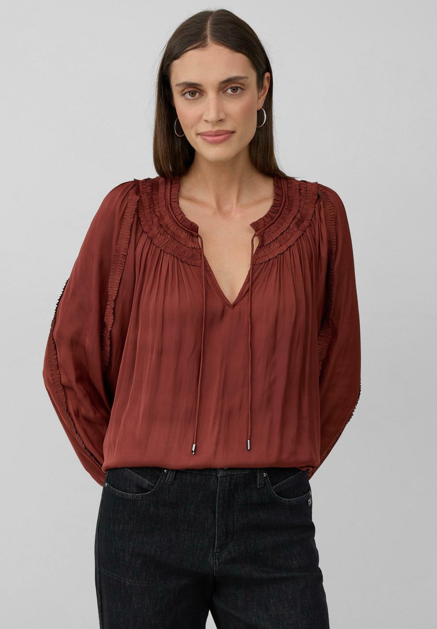 Блуза s.Oliver BLACK LABEL FLIESSENDE MIT RÜSCHEN, Rostrot/Bordeaux
Блуза s.Oliver BLACK LABEL FLIESSENDE MIT RÜSCHEN, Rostrot/Bordeaux