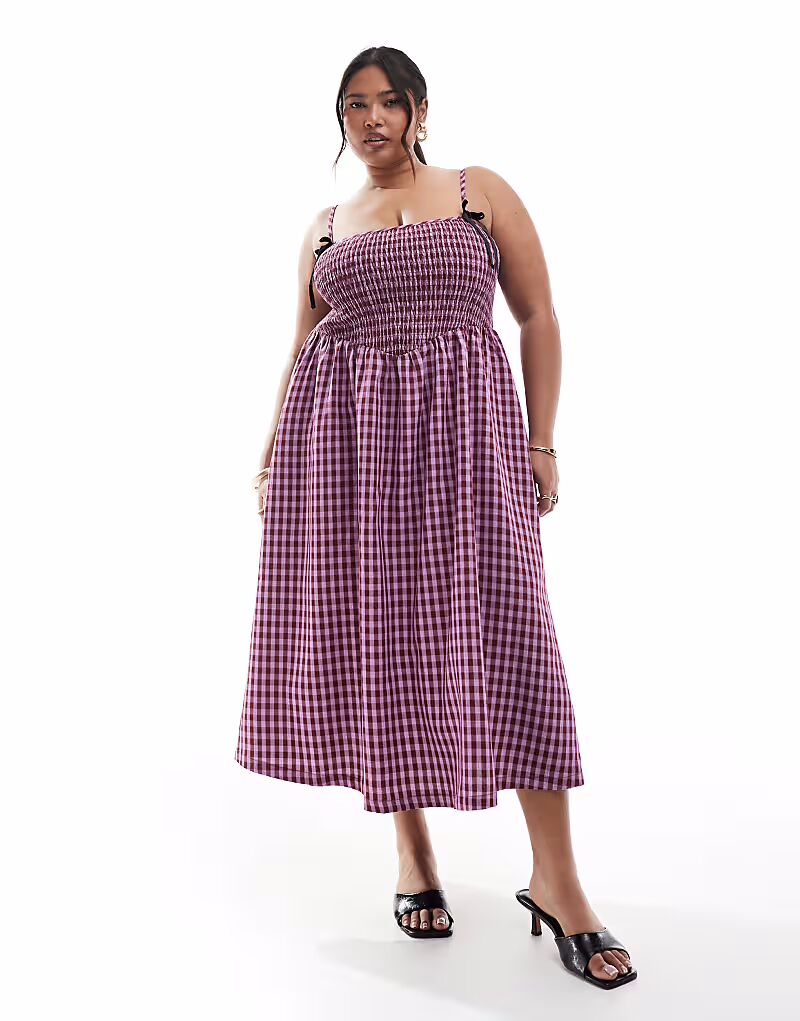 Эксклюзивное платье миди Renee Studio Plus с присборенными бретельками и бантом в фиолетово-красную клетку
Эксклюзивное платье миди Renee Studio Plus с присборенными бретельками и бантом в фиолетово-красную клетку