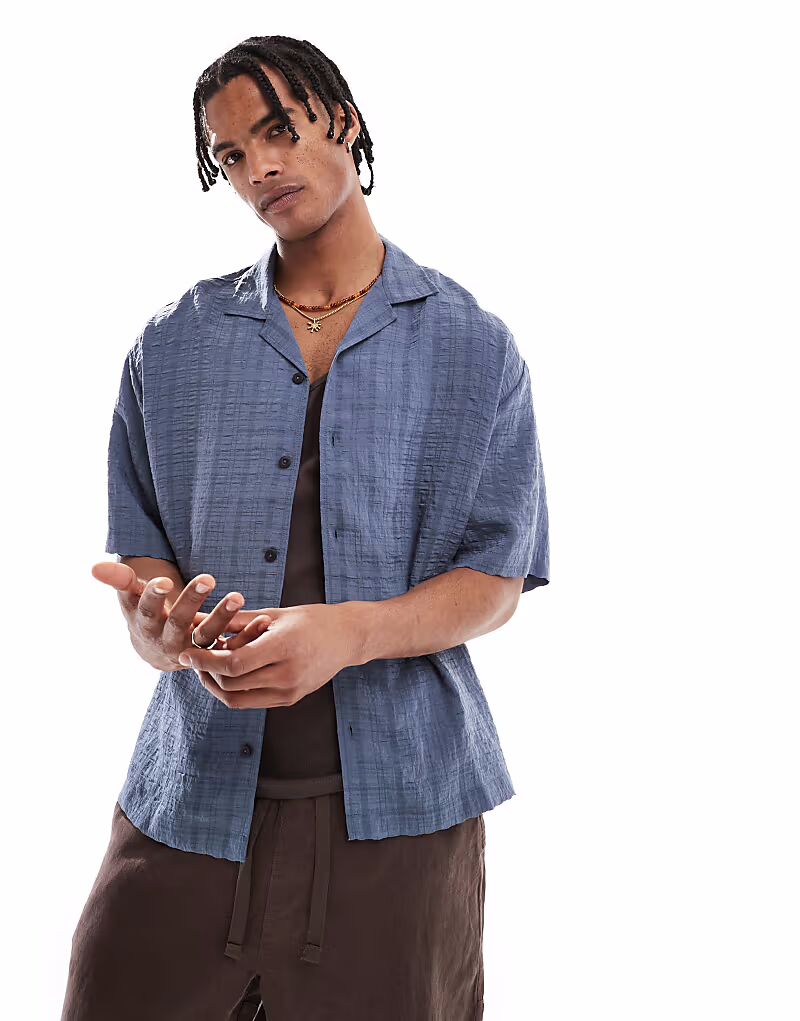 Клетчатая рубашка Pull&Bear из ткани сирсакер синего цвета
Клетчатая рубашка Pull&Bear из ткани сирсакер синего цвета