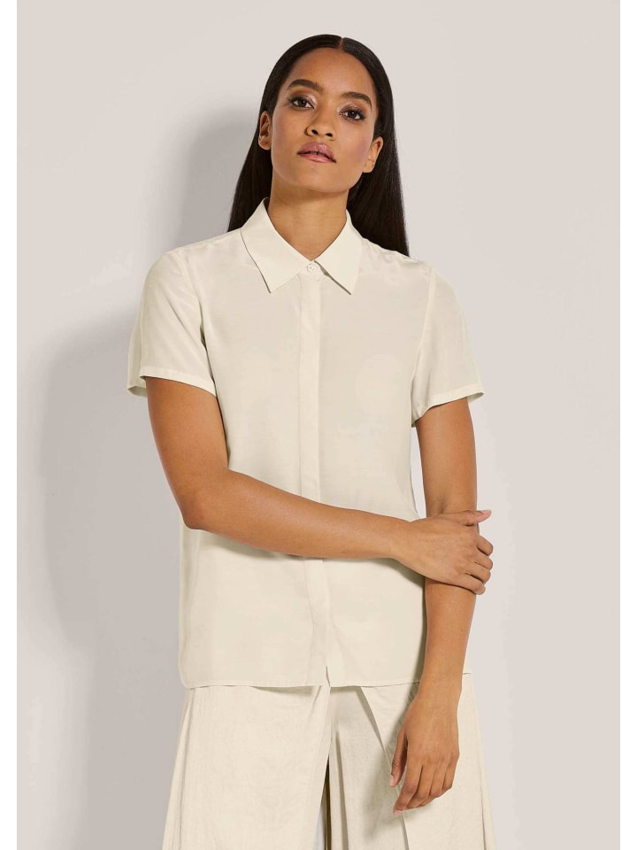 MADELEINE Элегантная летняя блузка с воротником-стойкой жемчужно-белого цвета
MADELEINE Элегантная летняя блузка с воротником-стойкой жемчужно-белого цвета