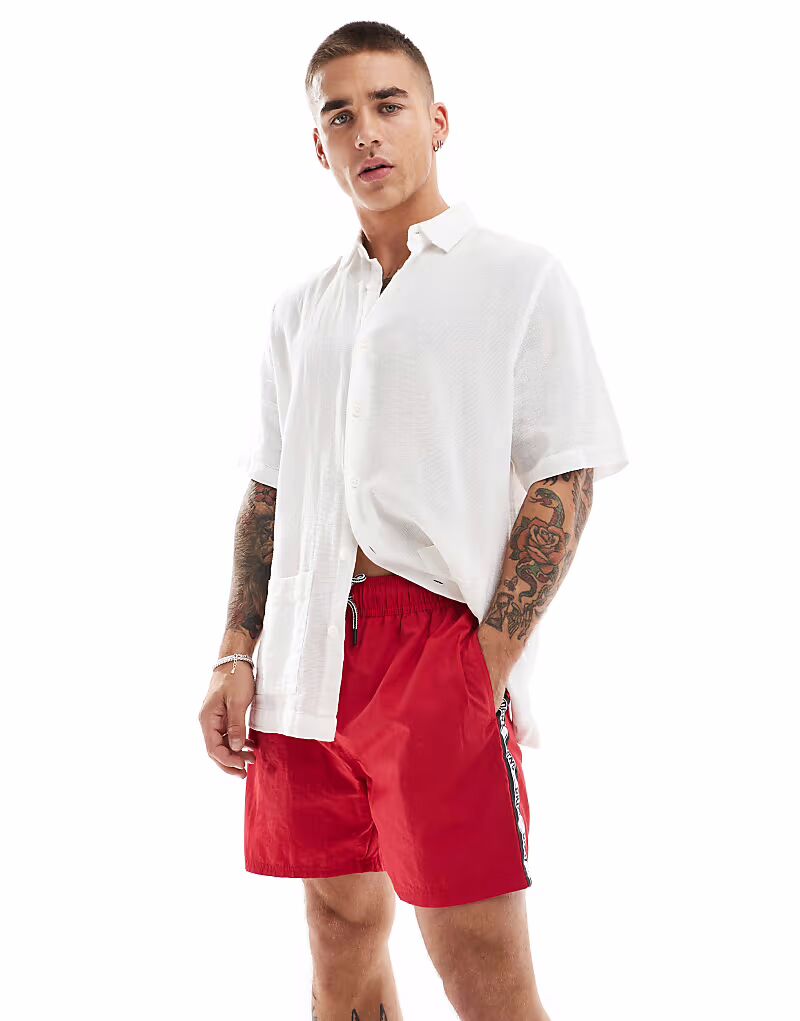 Шорты для плавания DKNY Caymen красного цвета 
Шорты для плавания DKNY Caymen красного цвета