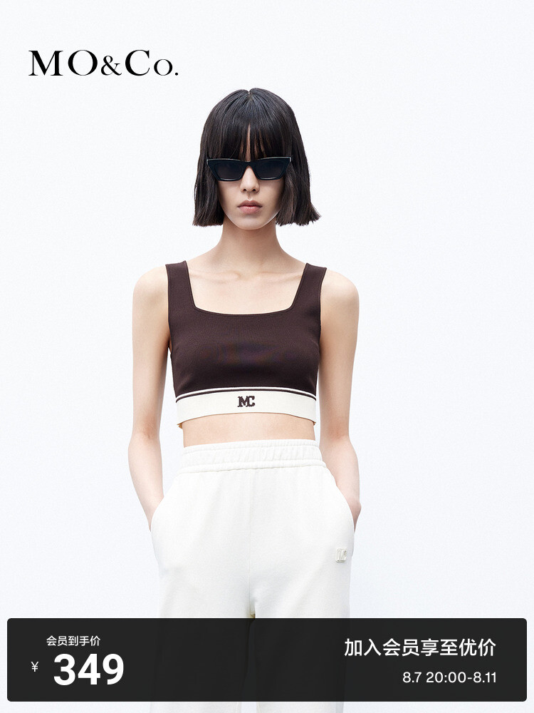 Короткий вязаный жилет Moco в американском стиле, черный
Короткий вязаный жилет Moco в американском стиле, черный