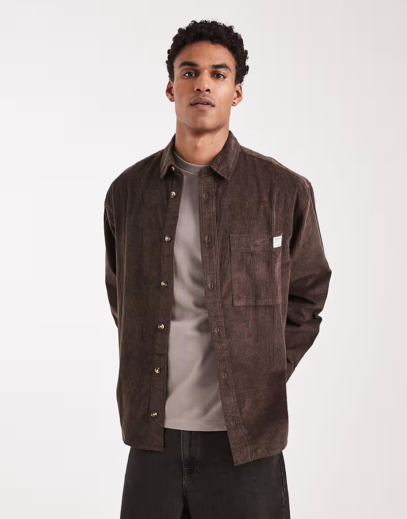 Рубашка свободного кроя из вельвета коричневого цвета с нашивкой Asos Design
Рубашка свободного кроя из вельвета коричневого цвета с нашивкой Asos Design