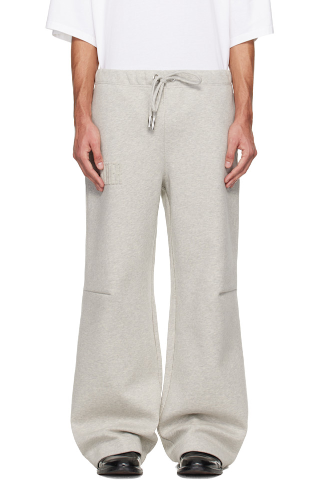 Jean Paul Gaultier Серые домашние брюки с тиснением "Готье"
Jean Paul Gaultier Серые домашние брюки с тиснением "Готье"