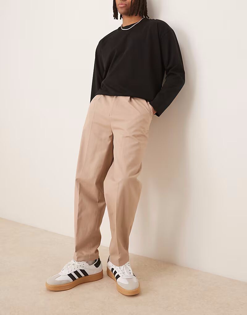 Элегантные зауженные брюки-чиносы ASOS DESIGN из 100% хлопка свободного кроя с боковыми регуляторами цвета светло-бежевого камня
Элегантные зауженные брюки-чиносы ASOS DESIGN из 100% хлопка свободного кроя с боковыми регуляторами цвета светло-бежевого камня