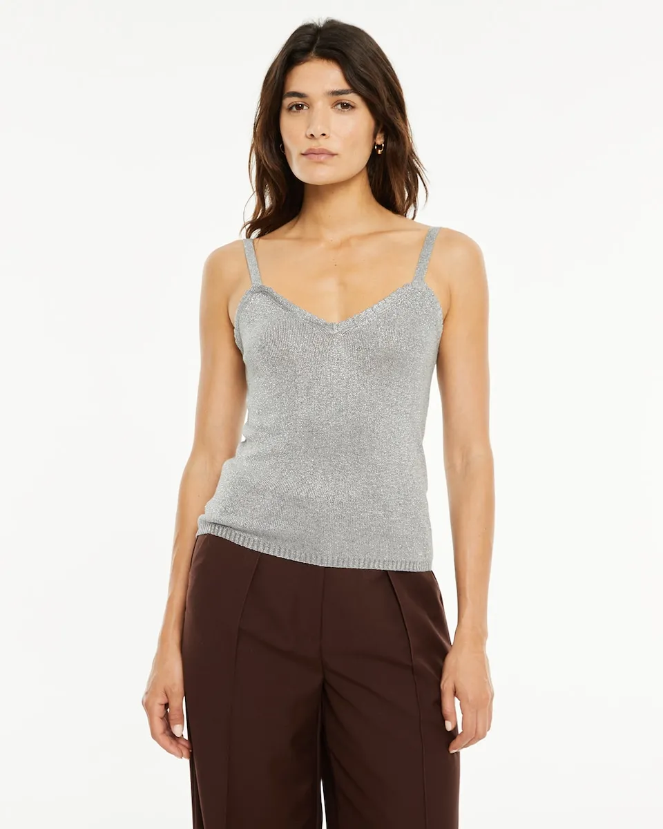 Женский трикотажный топ с люрексом с оформленным вырезом System Action, серебряный
Женский трикотажный топ с люрексом с оформленным вырезом System Action, серебряный