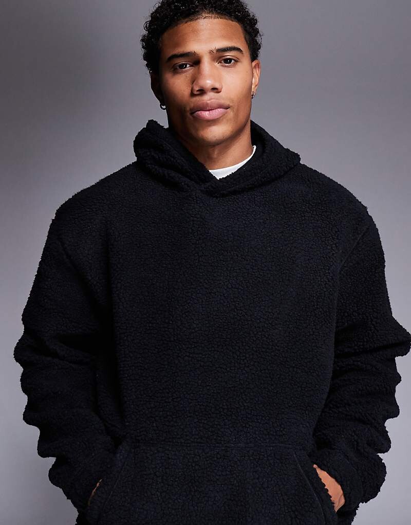 ASOS DESIGN – черная объемная толстовка из овчины с капюшоном
ASOS DESIGN – черная объемная толстовка из овчины с капюшоном