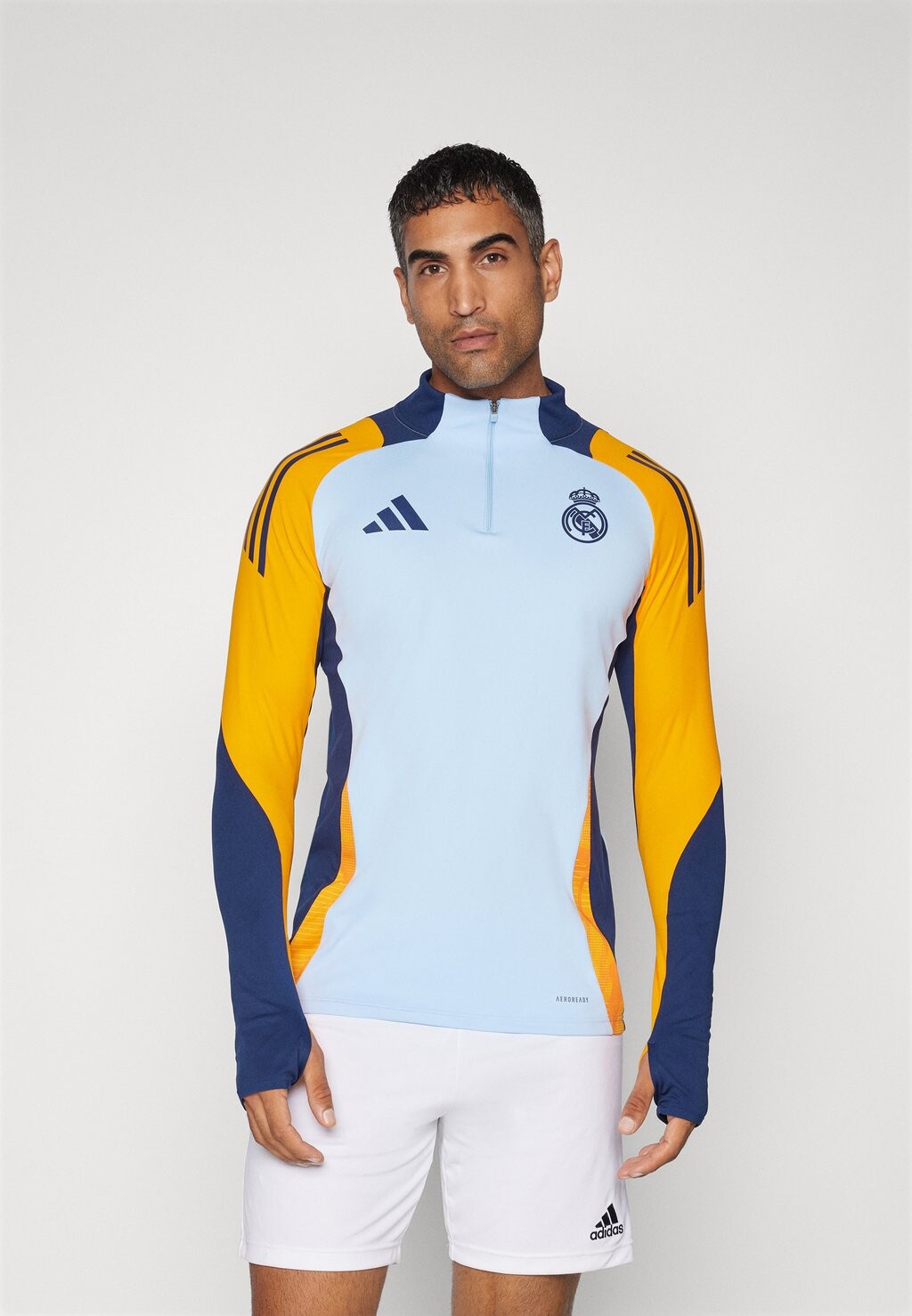 Команда adidas Performance, светится синим/оранжевым/оранжевым/темно-синим Real Madrid Training Top
Команда adidas Performance, светится синим/оранжевым/оранжевым/темно-синим Real Madrid Training Top