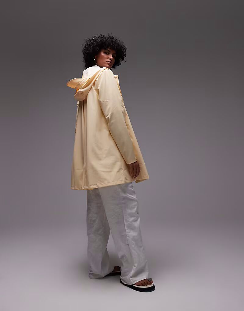 Водонепроницаемая куртка Rains A-силуэта светло-персикового цвета
Водонепроницаемая куртка Rains A-силуэта светло-персикового цвета