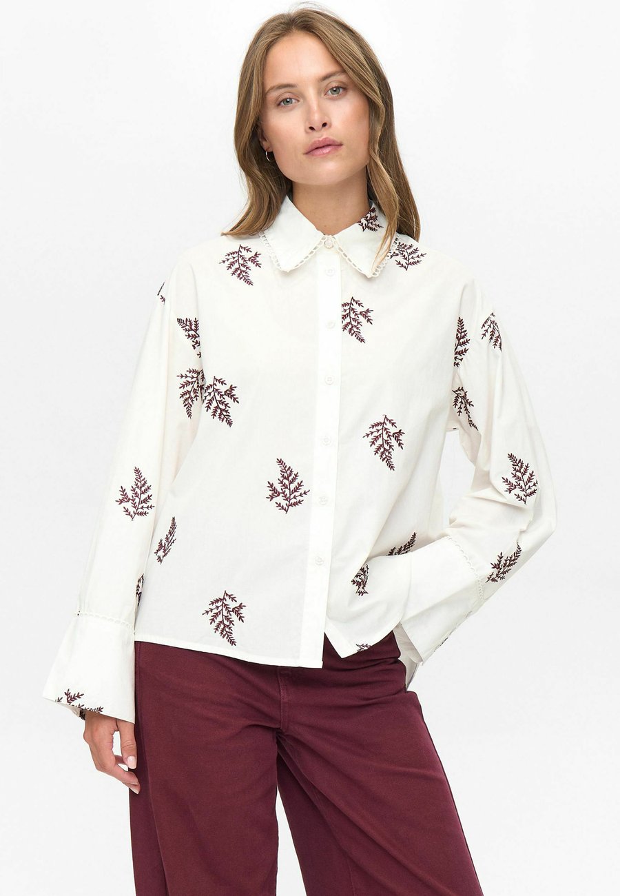 Блуза Nümph Button-down blouse, Winetasting/Red
Блуза Nümph Button-down blouse, Winetasting/Red