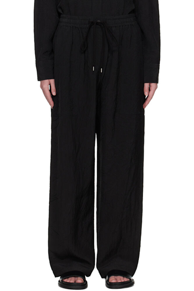 Черные брюки-капели Studio Nicholson
Черные брюки-капели Studio Nicholson