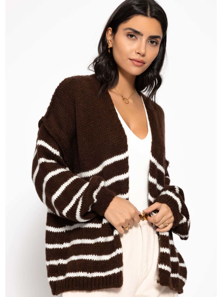 Открытый кардиган крупной вязки розового цвета SASSYCLASSY
Открытый кардиган крупной вязки розового цвета SASSYCLASSY