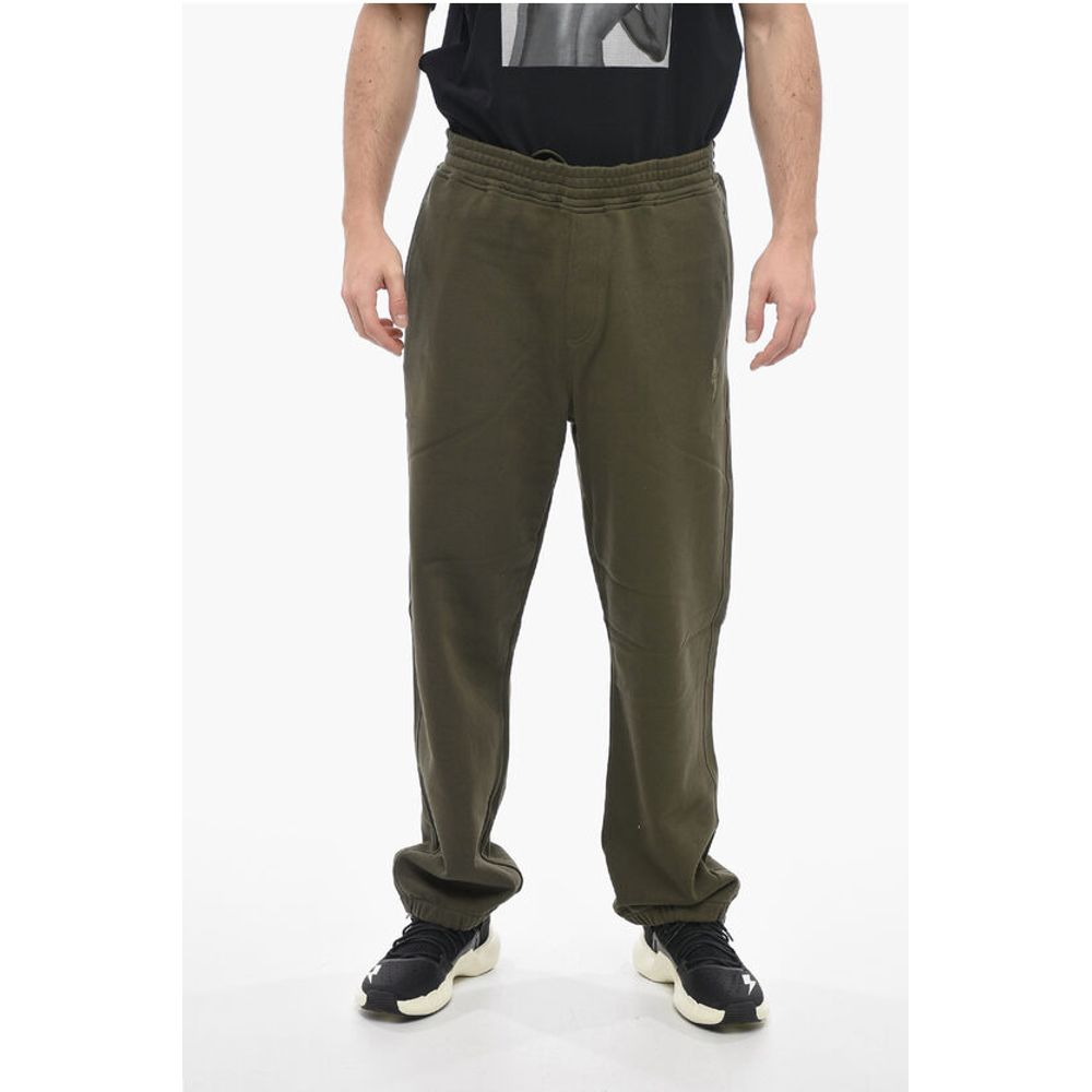 Спортивные брюки свободного кроя с эластичными манжетами Neil Barrett, Army
Спортивные брюки свободного кроя с эластичными манжетами Neil Barrett, Army