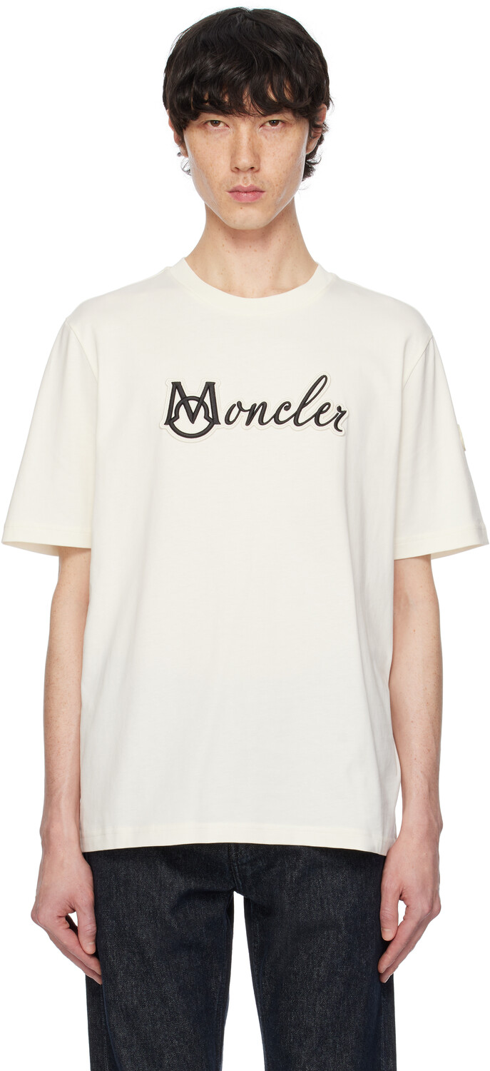 Футболка из хлопка с вышитым логотипом университета цвета «Off-White» Moncler 
Футболка из хлопка с вышитым логотипом университета цвета «Off-White» Moncler