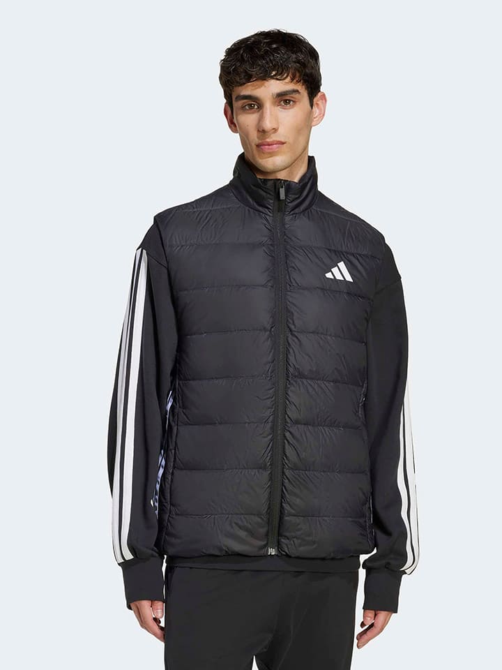 Adidas Пуховый жилет черного цвета
Adidas Пуховый жилет черного цвета