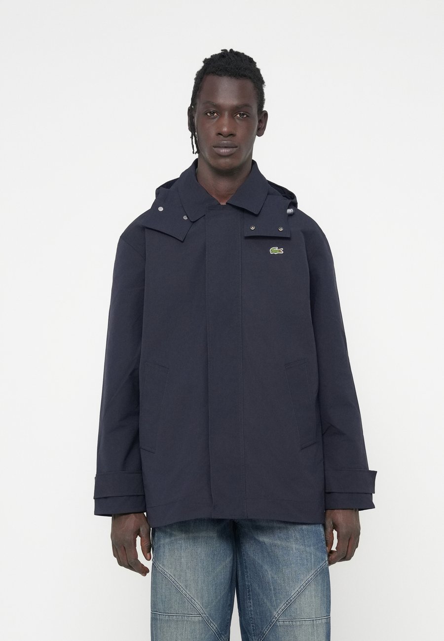Пальто Lacoste Parka, Abysm/Dark Blue
Пальто Lacoste Parka, Abysm/Dark Blue