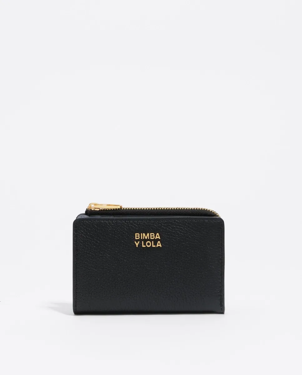 Женский кожаный кошелек черного цвета Bimba y Lola
Женский кожаный кошелек черного цвета Bimba y Lola