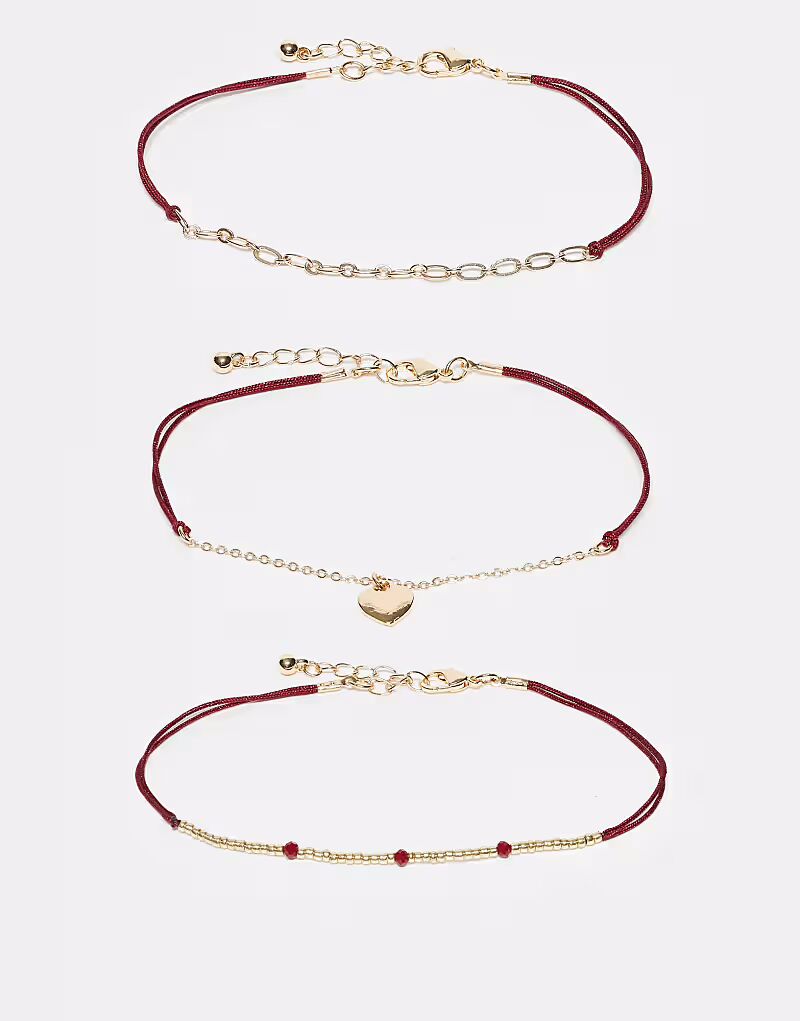 Набор из 3 браслетов на ногу с подвеской в виде сердца из красной веревки и золотистого оттенка Asos Design
Набор из 3 браслетов на ногу с подвеской в виде сердца из красной веревки и золотистого оттенка Asos Design