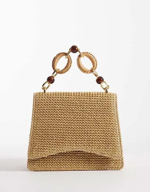 Соломенная сумка через плечо ASOS DESIGN с полимерной верхней ручкой и съемным ремешком через плечо натурального цвета
Соломенная сумка через плечо ASOS DESIGN с полимерной верхней ручкой и съемным ремешком через плечо натурального цвета