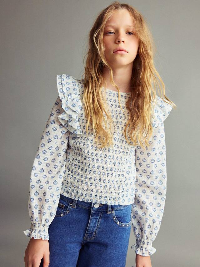 Детская блузка с рюшами на рукавах из мака-хлопка Mango, White/Blue
Детская блузка с рюшами на рукавах из мака-хлопка Mango, White/Blue