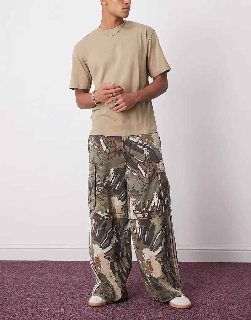 Брюки-карго adidas Originals с застежкой-молнией в цвете «мульти-зеленый»
Брюки-карго adidas Originals с застежкой-молнией в цвете «мульти-зеленый»