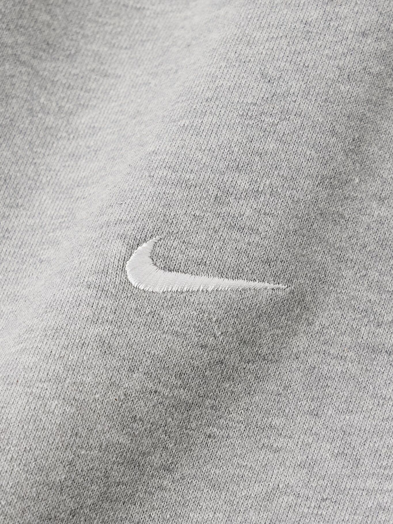 Спортивные брюки Solo Swoosh Tapered из хлопчатобумажной смеси с вышитым логотипом NIKE, серый
Спортивные брюки Solo Swoosh Tapered из хлопчатобумажной смеси с вышитым логотипом NIKE, серый