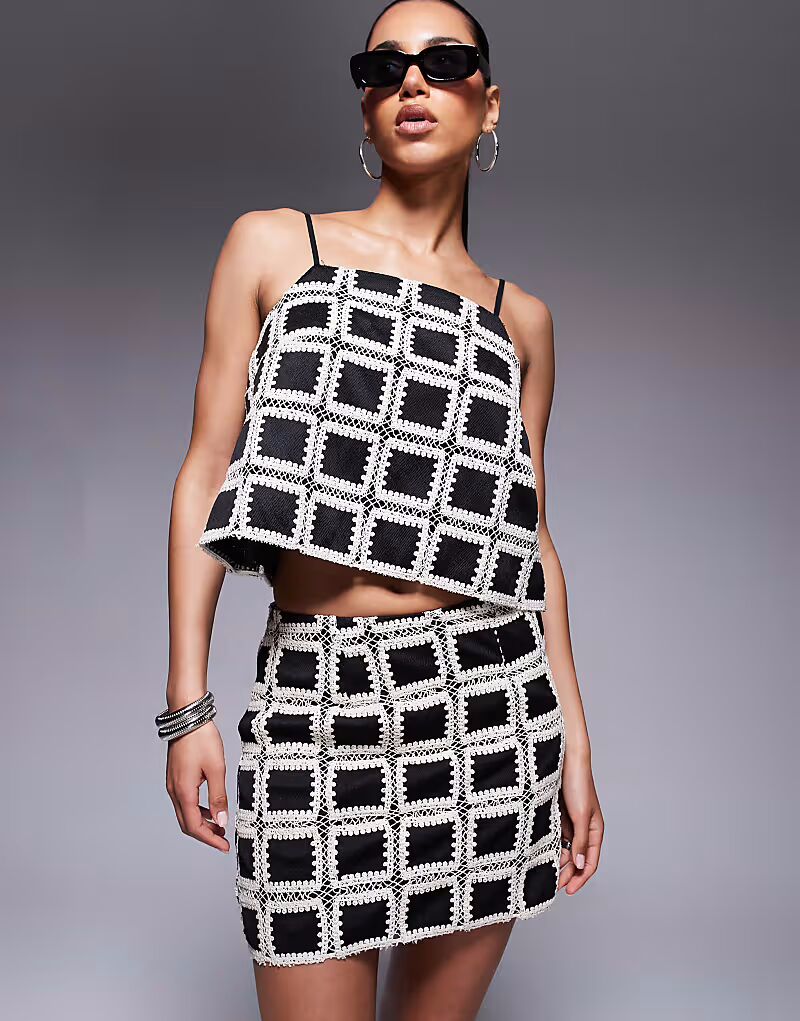 Вязаный топ черного цвета River Island
Вязаный топ черного цвета River Island
