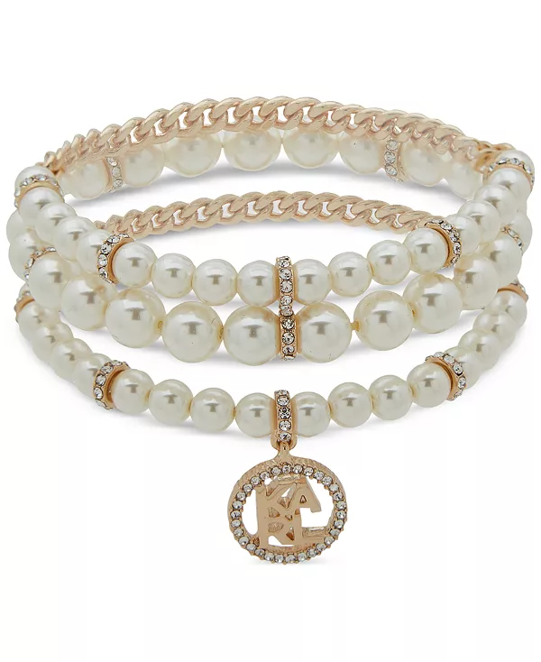 Комплект из 3-х эластичных браслетов золотистого оттенка с логотипом паве и искусственным жемчугом Karl Lagerfeld Paris, pearl
Комплект из 3-х эластичных браслетов золотистого оттенка с логотипом паве и искусственным жемчугом Karl Lagerfeld Paris, pearl