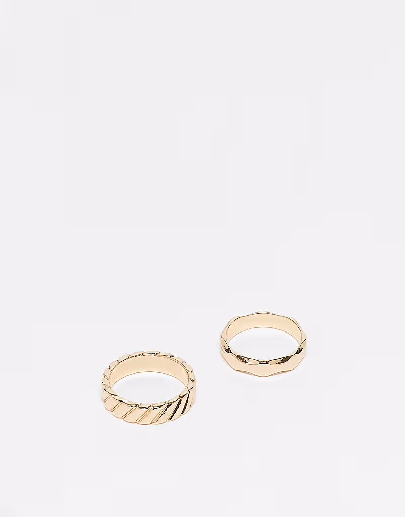 Набор из 2 колец из литого золота с ребристым узором Asos Design
Набор из 2 колец из литого золота с ребристым узором Asos Design