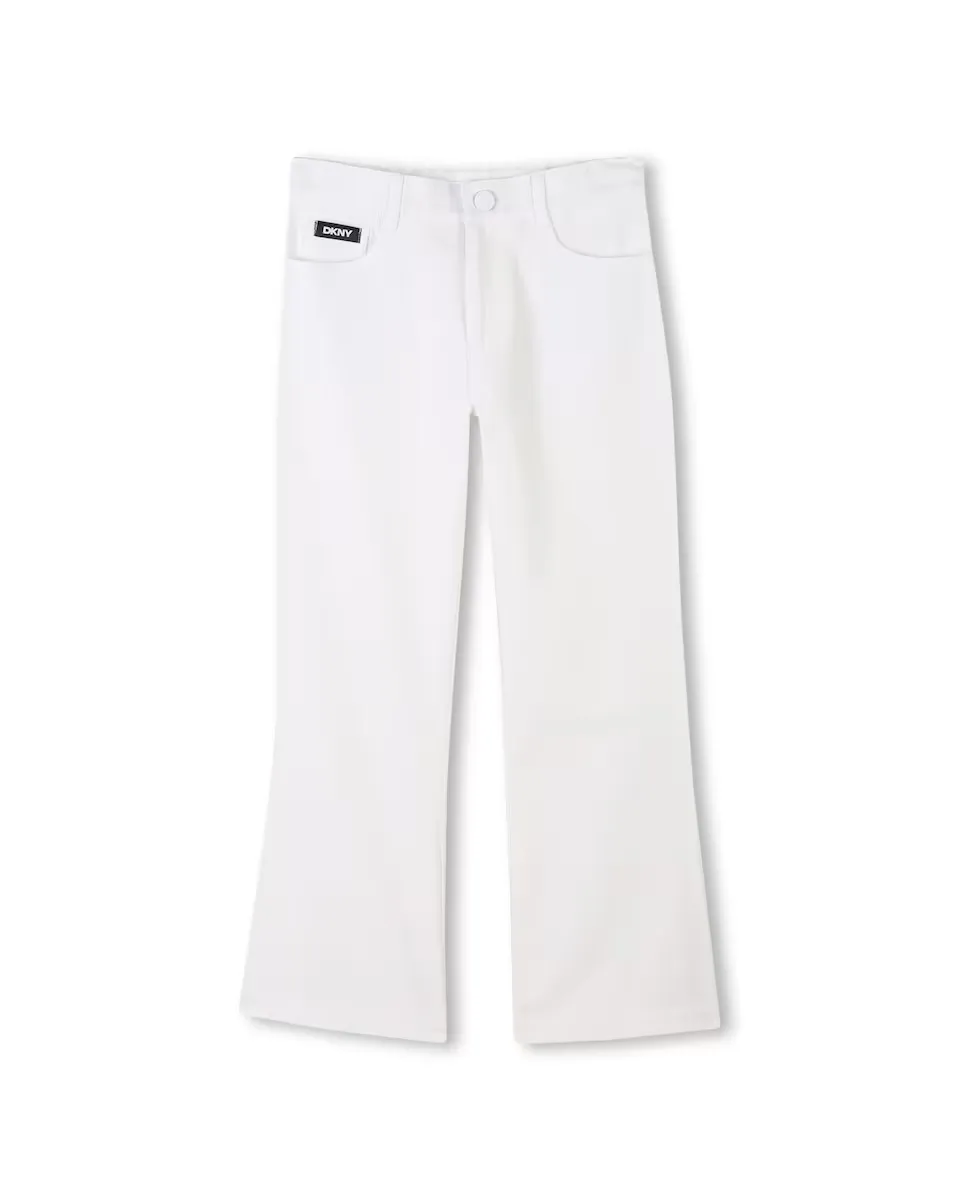 Однотонные брюки с пятью карманами для девочек слегка расклешены DKNY, белый
Однотонные брюки с пятью карманами для девочек слегка расклешены DKNY, белый