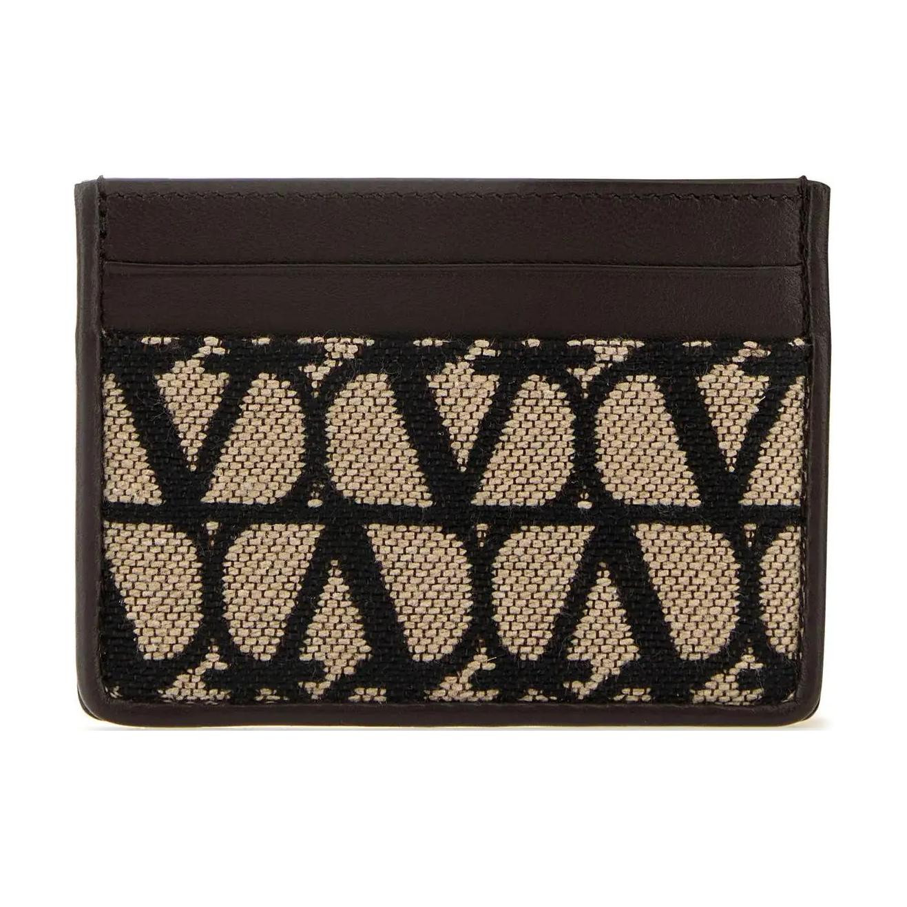 Кожаный текстильный держатель для карт мужской черный сахар Valentino
Кожаный текстильный держатель для карт мужской черный сахар Valentino