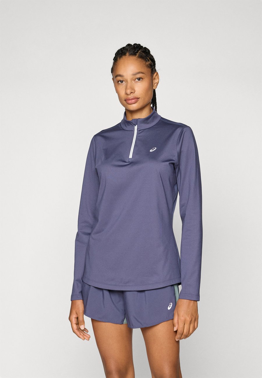 Топ ASICS CORE 1/2 ZIP WINTER TOP, Indigo Fog/Lilac
Топ ASICS CORE 1/2 ZIP WINTER TOP, Indigo Fog/Lilac