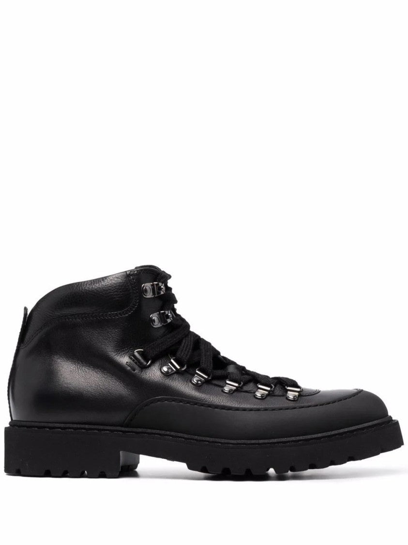 Прочные черные кожаные ботинки до щиколотки Doucal's
Прочные черные кожаные ботинки до щиколотки Doucal's