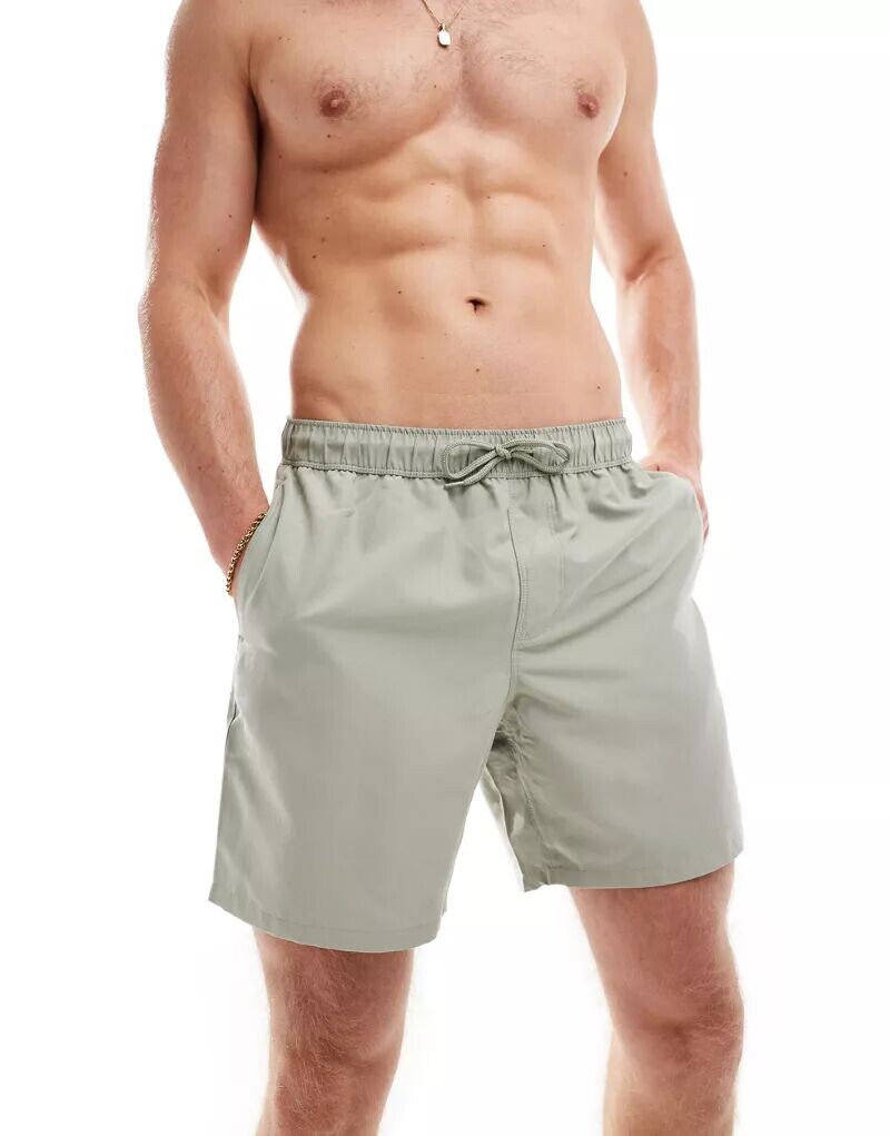 Зеленые плавки-шорты средней длины ASOS
Зеленые плавки-шорты средней длины ASOS