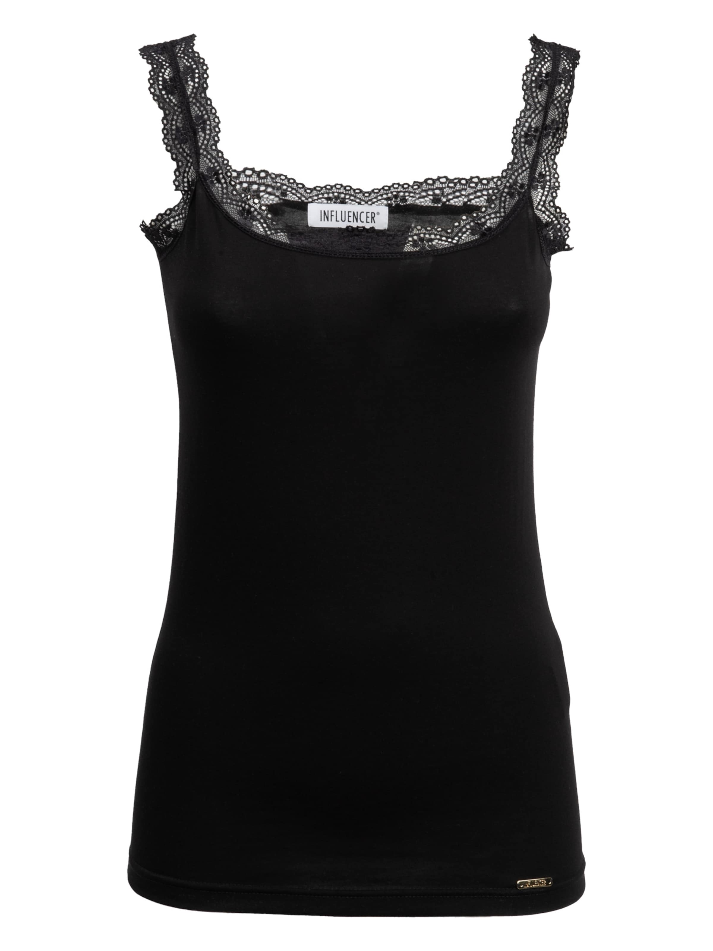 Influencer Топ в черном цвете
Influencer Топ в черном цвете