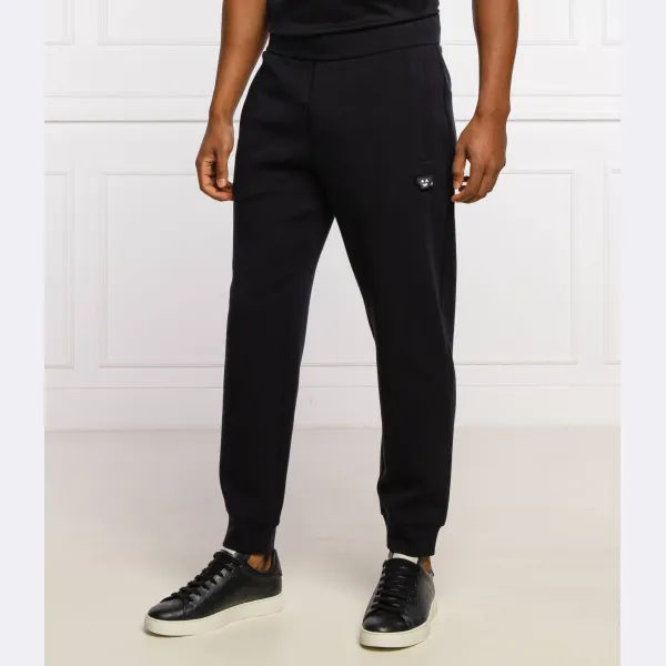 Спортивные брюки свободного кроя Emporio Armani, синий
Спортивные брюки свободного кроя Emporio Armani, синий