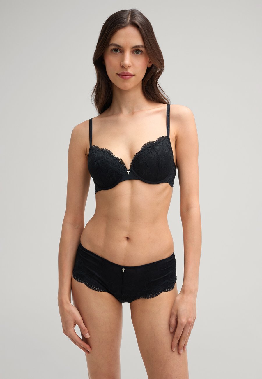 Бюстгальтер JOOP! Triangle bra, Schwarz/Black
Бюстгальтер JOOP! Triangle bra, Schwarz/Black