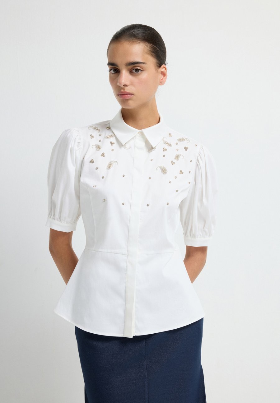 Блуза adL Button-down blouse, White /White
Блуза adL Button-down blouse, White /White