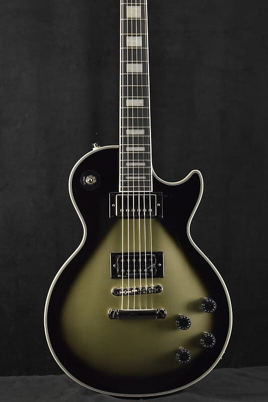 Электрогитара Epiphone Adam Jones Les Paul Custom Julie Heffernan’s Self-Portrait As Not Dead Yet Silverburst
Электрогитара Epiphone Adam Jones Les Paul Custom Julie Heffernan’s Self-Portrait As Not Dead Yet Silverburst