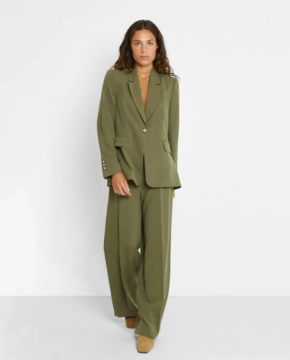 Женский блейзер с отложным воротником Trucco, темно-зеленый
Женский блейзер с отложным воротником Trucco, темно-зеленый