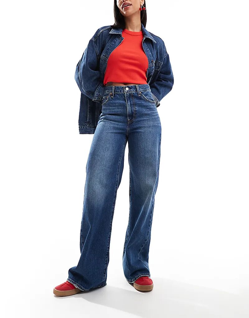 Джинсы с высокой посадкой и широкими штанинами темно-синего цвета Levi's
Джинсы с высокой посадкой и широкими штанинами темно-синего цвета Levi's