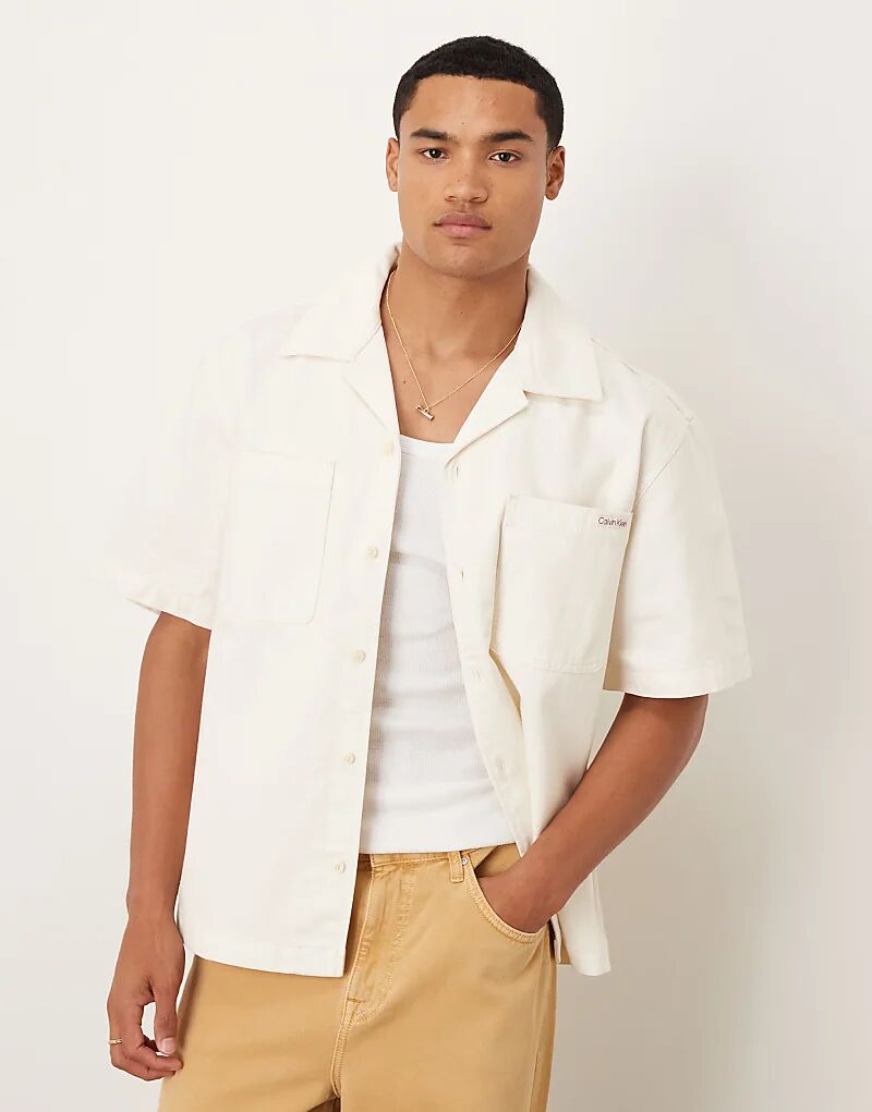 Рубашка Calvin Klein Jeans в бежево-белом цвете
Рубашка Calvin Klein Jeans в бежево-белом цвете